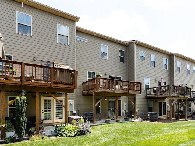1839 Shumard Ln, Charlotte, NC 28205 - back of house featuring a wooden deck, a yard, and a patio area