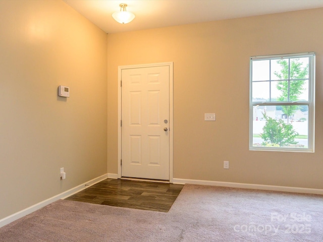 13022 Hill Pine Rd, Midland, NC 28107 - entryway with baseboards and dark colored carpet