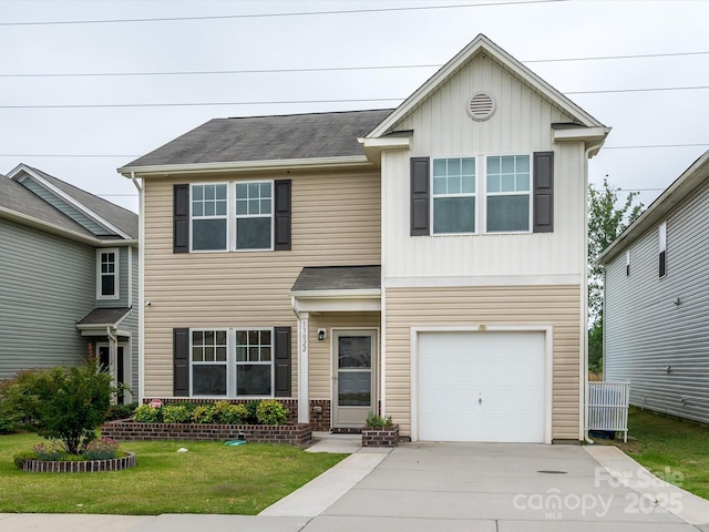 13022 Hill Pine Rd, Midland, NC 28107 - traditional home featuring a garage, a front yard, driveway, board and batten siding, and roof with shingles