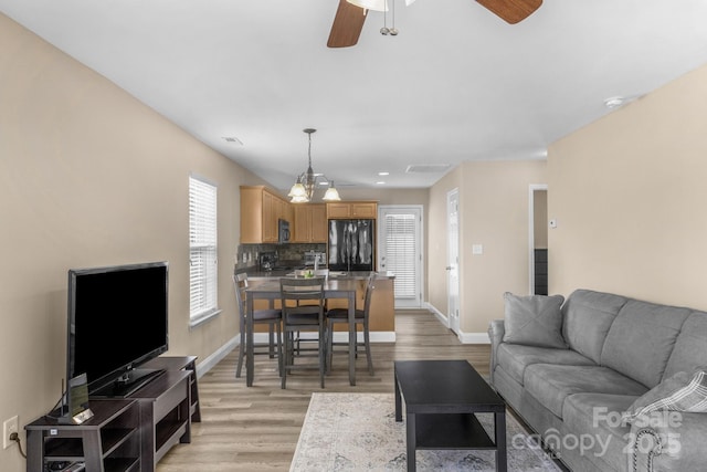 1907 Sandal Brook Rd, Fort Mill, SC 29707 - living room with plenty of natural light, light wood-style flooring, ceiling fan, and baseboards