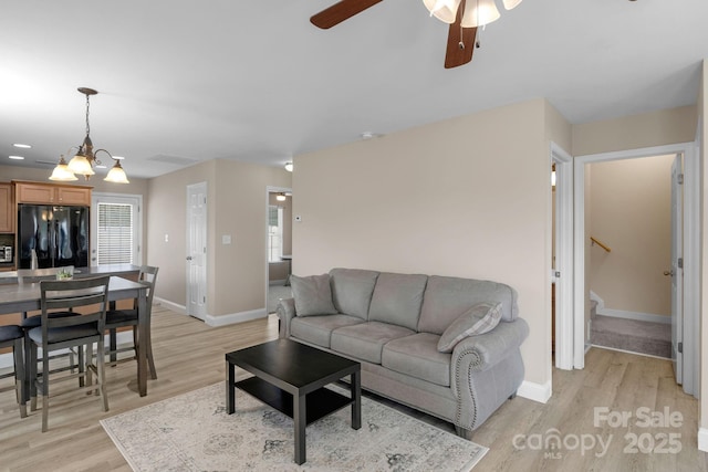 1907 Sandal Brook Rd, Fort Mill, SC 29707 - living area with light wood finished floors, stairs, baseboards, and ceiling fan