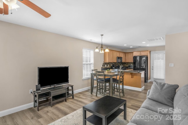 1907 Sandal Brook Rd, Fort Mill, SC 29707 - living area featuring light wood-style floors, baseboards, recessed lighting, and a ceiling fan