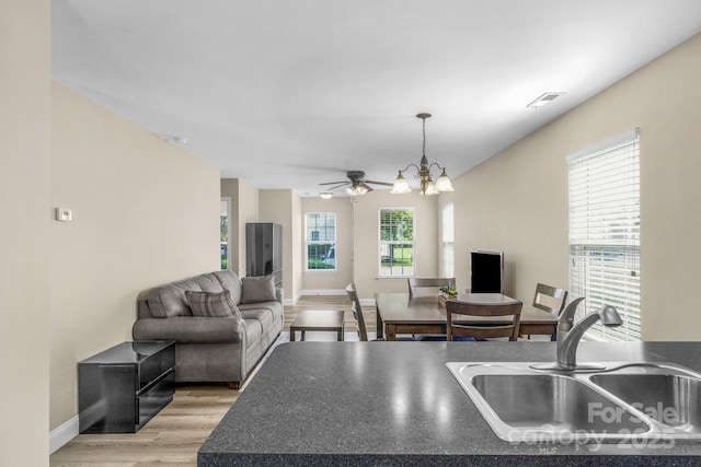 1907 Sandal Brook Rd, Fort Mill, SC 29707 - kitchen with a sink, plenty of natural light, a ceiling fan, and dark countertops