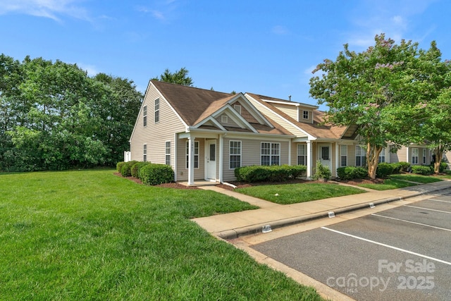 1907 Sandal Brook Rd, Fort Mill, SC 29707 - view of front facade featuring uncovered parking and a front lawn