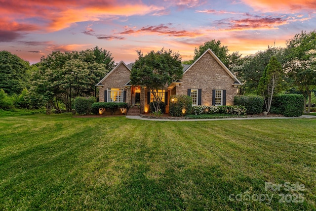 1115 Maremont Ct, Matthews, NC 28104 - view of front of property with brick siding and a front lawn