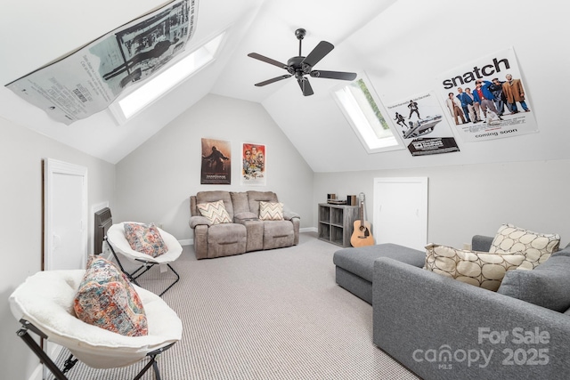 1115 Maremont Ct, Matthews, NC 28104 - living area with a skylight, vaulted ceiling, carpet flooring, and a ceiling fan