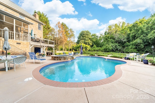 1115 Maremont Ct, Matthews, NC 28104 - view of swimming pool with a patio, a pool with connected hot tub, view of scattered trees, outdoor dining area, and stairs