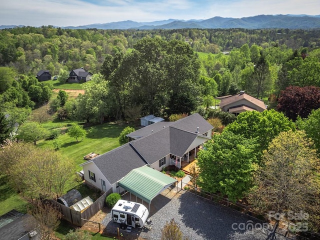 54 Donna Ln, Alexander, NC 28701 - aerial view of property and surrounding area featuring a forest and mountains