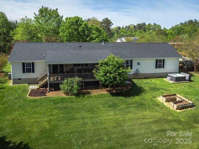 54 Donna Ln, Alexander, NC 28701 - rear view of house with crawl space, a yard, a sunroom, and a vegetable garden