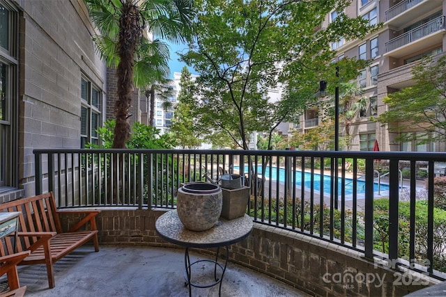 718 W Trade St Unit 105, Charlotte, NC 28202 - balcony with view of pool