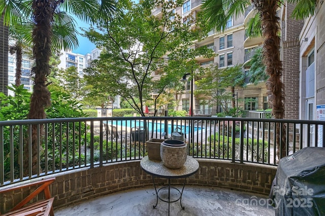 718 W Trade St Unit 105, Charlotte, NC 28202 - balcony with a grill and view of pool area