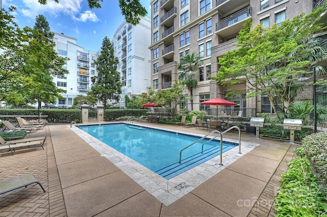 718 W Trade St Unit 105, Charlotte, NC 28202 - community pool with grilling area and a patio area
