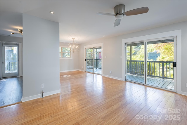 110 Annandale Ave, Asheville, NC 28801 - spare room with a ceiling fan, a chandelier, healthy amount of natural light, light wood finished floors, and recessed lighting