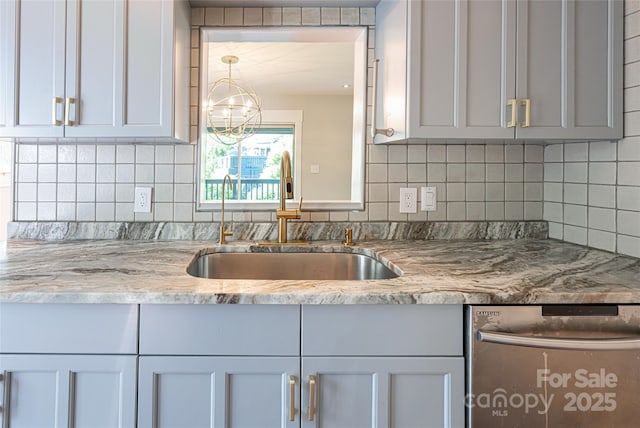 110 Annandale Ave, Asheville, NC 28801 - kitchen featuring a sink, dishwasher, a chandelier, backsplash, and light stone countertops