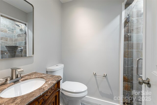 110 Annandale Ave, Asheville, NC 28801 - bathroom with vanity, a tile shower, and toilet