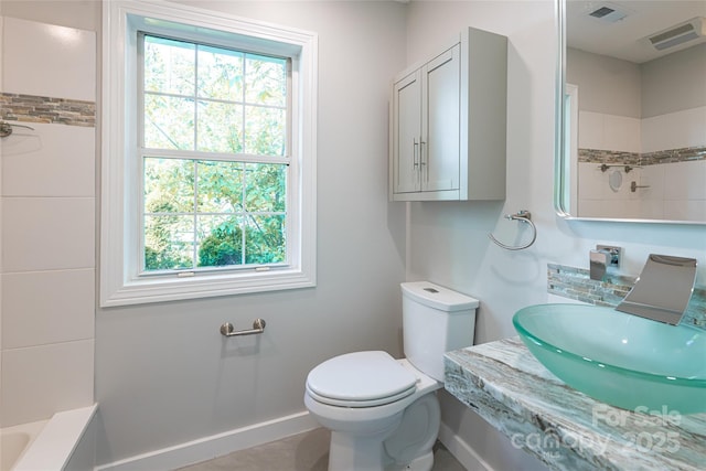 110 Annandale Ave, Asheville, NC 28801 - bathroom featuring healthy amount of natural light, baseboards, and toilet