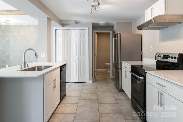 110 Annandale Ave, Asheville, NC 28801 - kitchen with range with electric stovetop, a sink, dishwasher, freestanding refrigerator, and light countertops