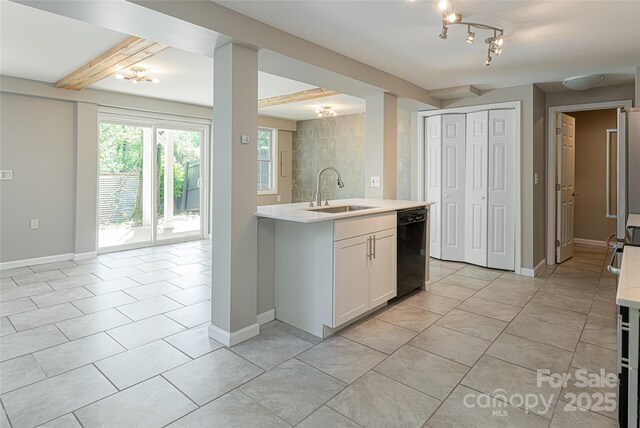 110 Annandale Ave, Asheville, NC 28801 - kitchen featuring a sink, black dishwasher, light countertops, light tile patterned flooring, and beam ceiling