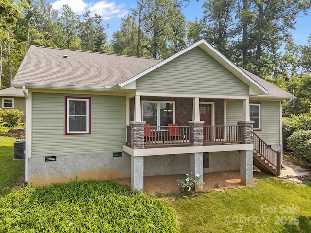 17 Laurel Rd, Arden, NC 28704 - rear view of house featuring a porch, roof with shingles, central AC, crawl space, and a yard