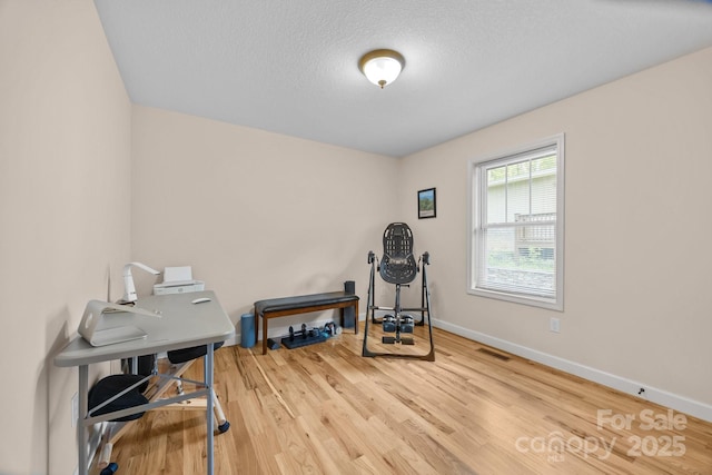 17 Laurel Rd, Arden, NC 28704 - office with baseboards, wood finished floors, and a textured ceiling