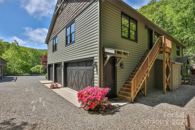 1283 Leafstone Cir, Sylva, NC 28779 - view of side of property featuring a garage, stairs, and driveway