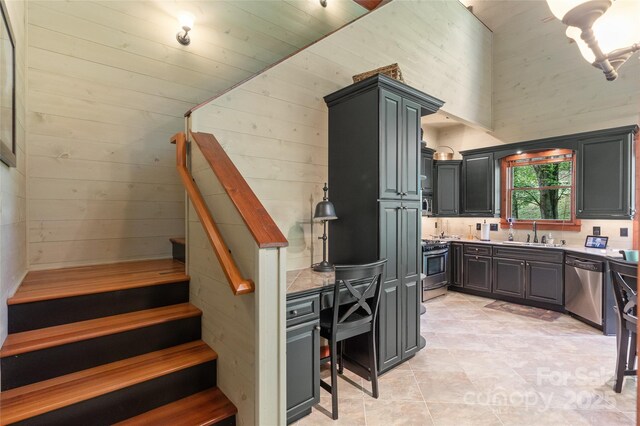 1283 Leafstone Cir, Sylva, NC 28779 - staircase featuring wooden walls and tile patterned floors