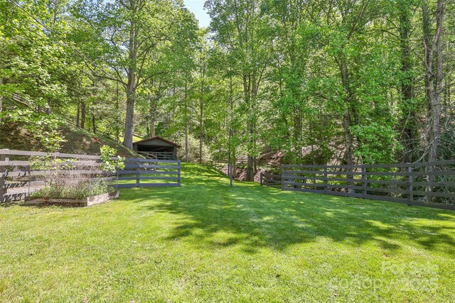1283 Leafstone Cir, Sylva, NC 28779 - view of yard with an outdoor structure and a vegetable garden