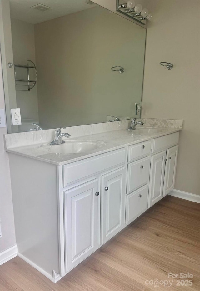 9372 Island Point Rd, Sherrills Ford, NC 28673 - full bath featuring wood finished floors and double vanity