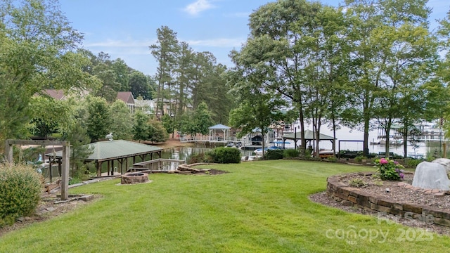 9372 Island Point Rd, Sherrills Ford, NC 28673 - view of grassy yard featuring a fire pit and a water view