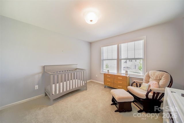 2035 Beacon Ave, Monroe, NC 28110 - bedroom with light carpet and baseboards