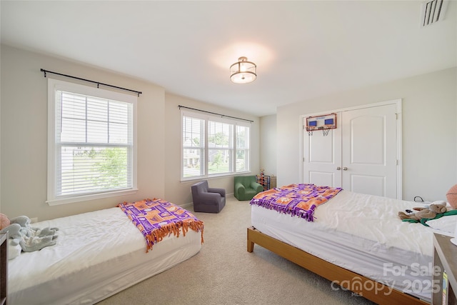 2035 Beacon Ave, Monroe, NC 28110 - carpeted bedroom with a closet