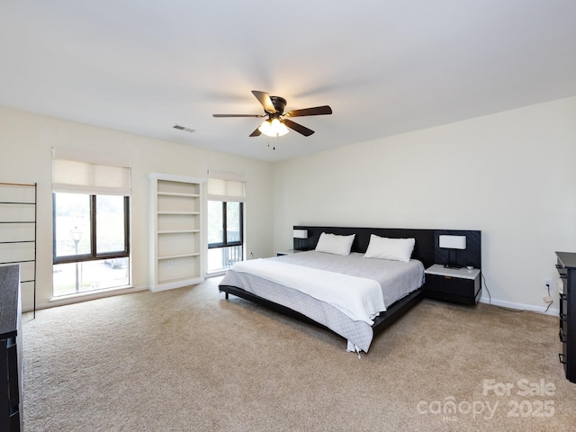 5809 Sharon Rd Unit G, Charlotte, NC 28210 - bedroom with light carpet, ceiling fan, and baseboards