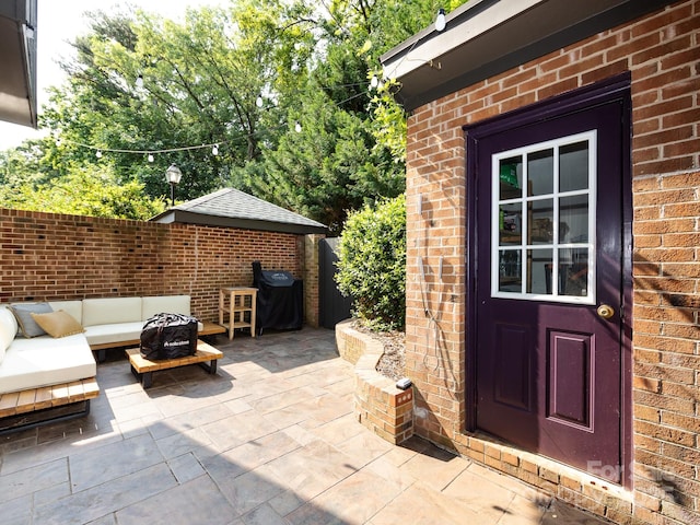 5809 Sharon Rd Unit G, Charlotte, NC 28210 - view of patio featuring an outdoor hangout area and a grill