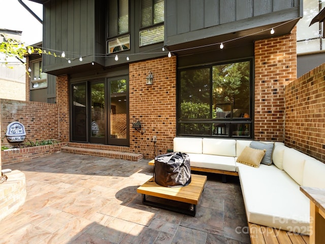 5809 Sharon Rd Unit G, Charlotte, NC 28210 - view of patio / terrace featuring french doors and an outdoor living space