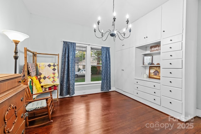 606 1st St W, Conover, NC 28613 - dining area with a chandelier and dark wood-type flooring