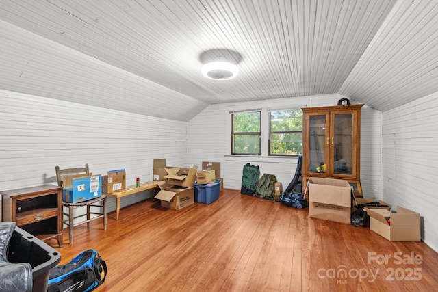 606 1st St W, Conover, NC 28613 - additional living space featuring vaulted ceiling, wooden ceiling, wood walls, and wood finished floors