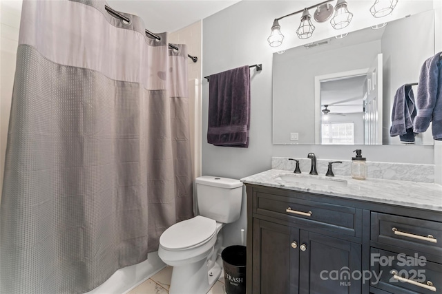 945 Heritage Pkwy, Fort Mill, SC 29715 - full bath with vanity, toilet, marble finish flooring, ceiling fan, and shower / bath combo with shower curtain