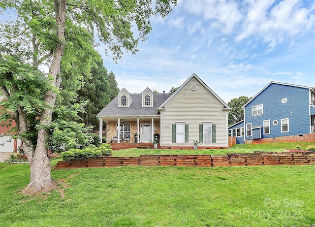 10449 Quiet Bay Ct, Charlotte, NC 28278 - cape cod-style house with a front lawn, a porch, and stone siding