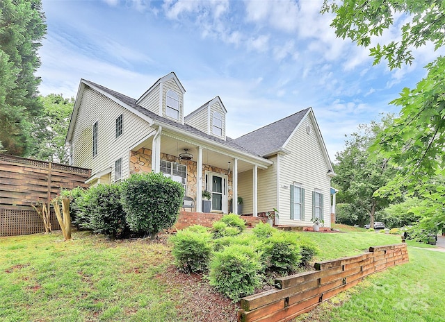 10449 Quiet Bay Ct, Charlotte, NC 28278 - view of front of home featuring stone siding, covered porch, and roof with shingles