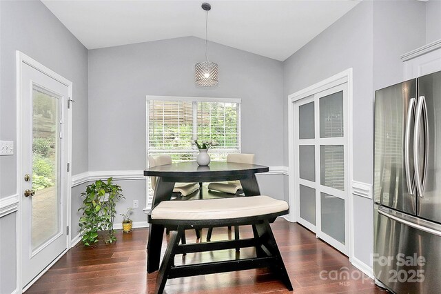 10449 Quiet Bay Ct, Charlotte, NC 28278 - dining room featuring vaulted ceiling and dark wood-style floors