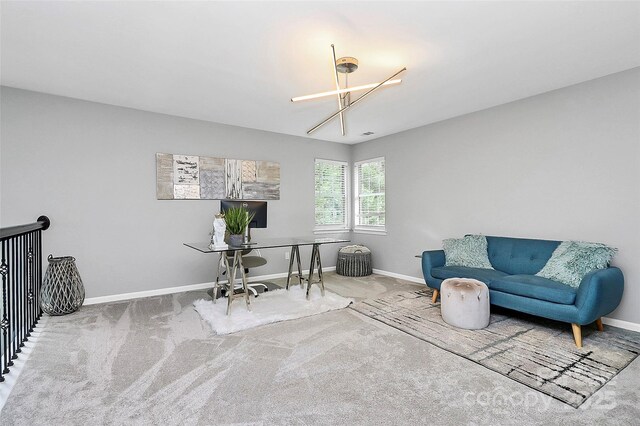 10449 Quiet Bay Ct, Charlotte, NC 28278 - home office with baseboards, carpet, and a chandelier
