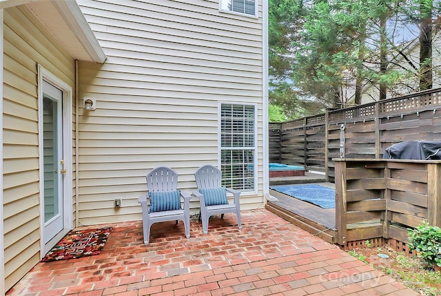 10449 Quiet Bay Ct, Charlotte, NC 28278 - view of patio / terrace with a deck and a grill
