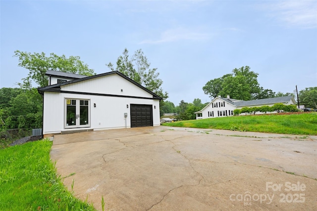 1076 W Henderson St, Marion, NC 28752 - garage with french doors and driveway