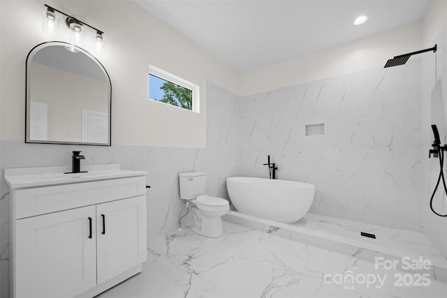1076 W Henderson St, Marion, NC 28752 - full bath featuring marble finish floors, vanity, toilet, a marble finish shower, and a freestanding bath