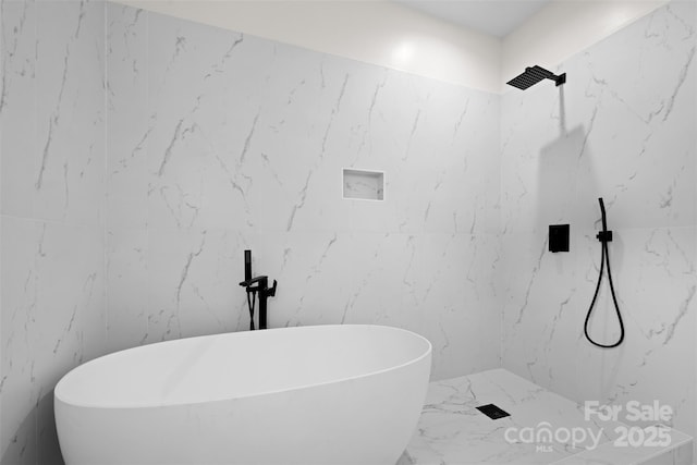 1076 W Henderson St, Marion, NC 28752 - bathroom featuring marble finish floors, a freestanding bath, and a marble finish shower