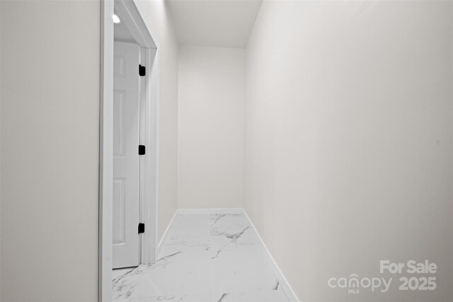 1076 W Henderson St, Marion, NC 28752 - corridor with marble finish flooring and baseboards