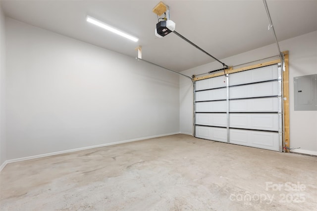 1076 W Henderson St, Marion, NC 28752 - garage featuring electric panel, a garage door opener, and baseboards
