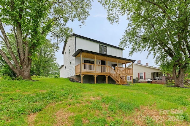 1076 W Henderson St, Marion, NC 28752 - back of property featuring stairs and a yard