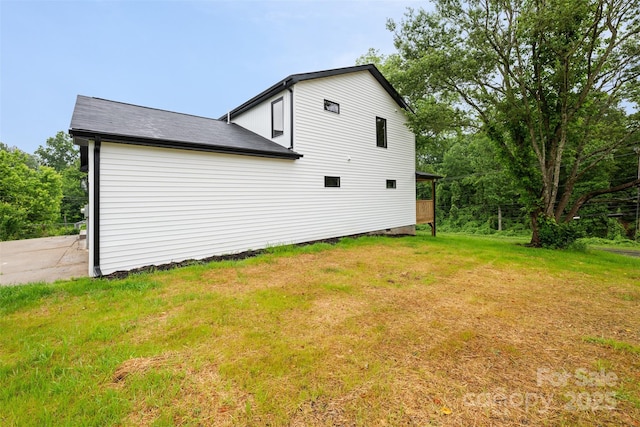 1076 W Henderson St, Marion, NC 28752 - view of side of home with a yard