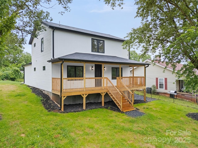 1076 W Henderson St, Marion, NC 28752 - rear view of house featuring a lawn, central air condition unit, and a porch